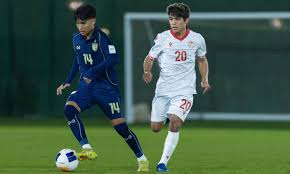 Timnas U17 Thailand (berbaju biru) kalah dari Timnas U17 Tajikistan dalam pertandingan pembuka mereka - Foto: AFC