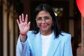 Venezuela’s acting President Delcy Rodriguez waves after bidding farewell to U.S. Energy Secretary Chris Wright following their meeting at Miraflores Palace in Caracas, Venezuela, Feb. 11, 2026. (AP Photo/Ariana Cubillos, File)