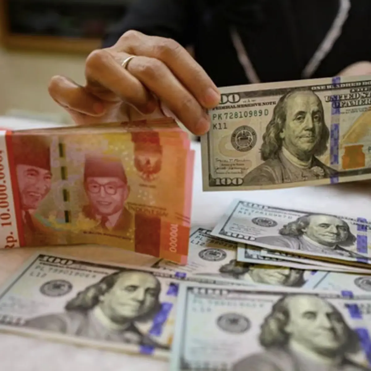 Ilustrasi nilai tukar rupiah terhadap dolar AS.(MI/Usman Iskandar)