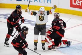 The Golden Knights' Pavel Dorofeyev (16) celebrates between the Hurricanes' Jalen Chatfield (5), Alexander Nikishin (21) and goaltender Frederik Andersen (31) after a second-period goal. Photograph: Ben McKeown/AP