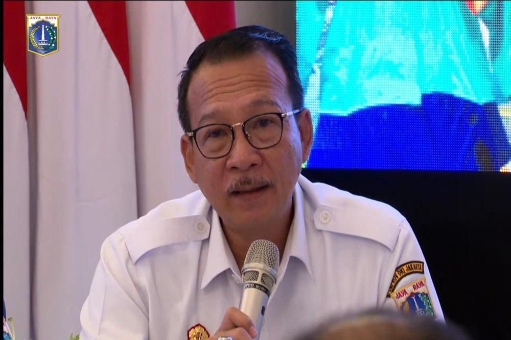 Kepala Badan Pengelolaan Keuangan Daerah (BPKD) Provinsi DKI Jakarta, Michael Rolandi Cesnanta Brata dalam Konferensi Pers Realisasi APBD Jakarta Triwulan II tahun 2026 di Balai Kota DKI Jakarta, Rabu (22/7/2026). Sumber: YouTube Pemerintah Provinsi DKI Jakarta.